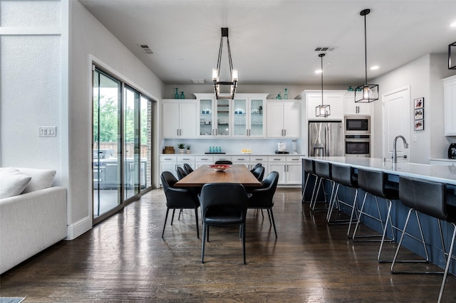 840 Redstem Dr, Prosper, TX 75078 - dining space featuring dark wood-style floors and recessed lighting