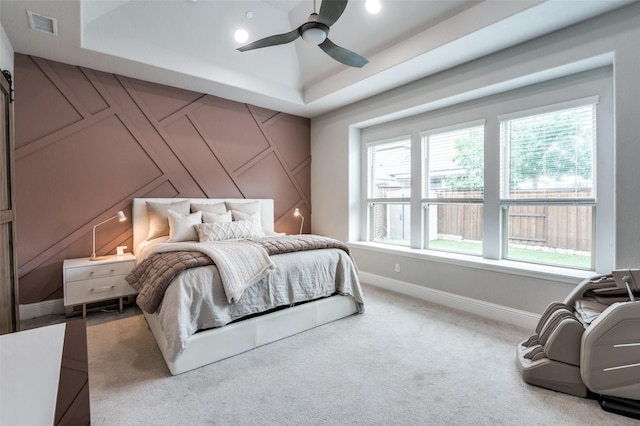 840 Redstem Dr, Prosper, TX 75078 - carpeted bedroom featuring a decorative wall, a ceiling fan, and a raised ceiling