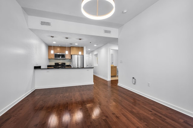 1200 Main St Unit 707, Dallas, TX 75202 - unfurnished living room with dark wood-type flooring and baseboards