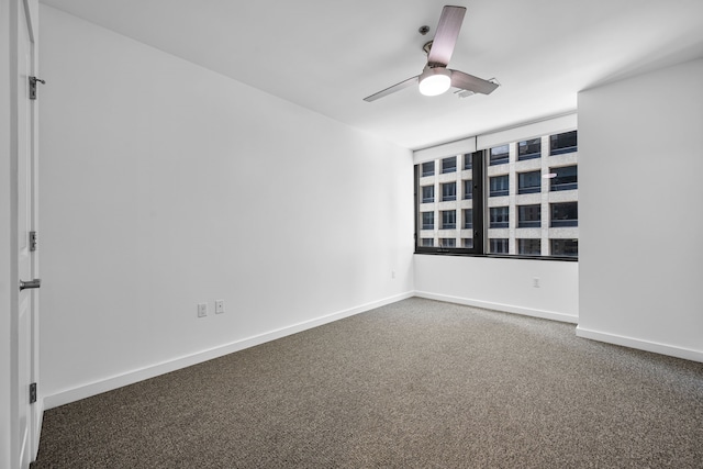 1200 Main St Unit 707, Dallas, TX 75202 - carpeted empty room with ceiling fan and baseboards