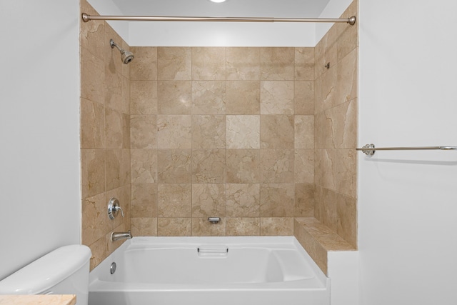 1200 Main St Unit 707, Dallas, TX 75202 - bathroom featuring toilet and bathtub / shower combination