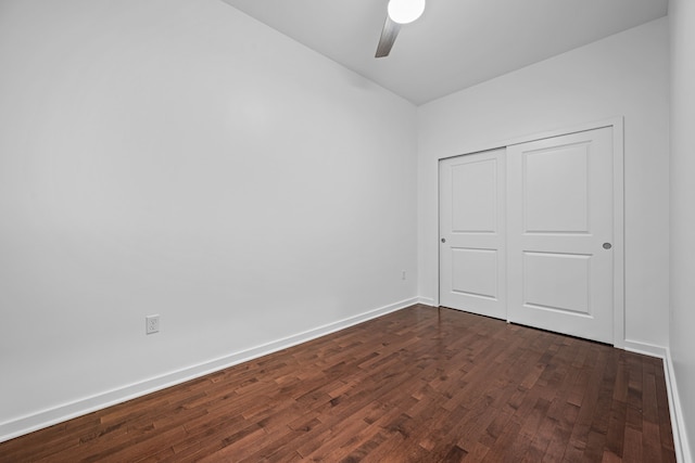 1200 Main St Unit 707, Dallas, TX 75202 - unfurnished bedroom featuring dark wood-type flooring, a closet, and a ceiling fan