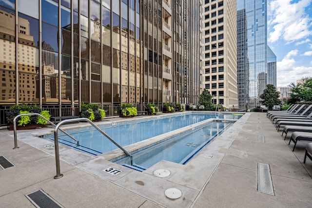 1200 Main St Unit 707, Dallas, TX 75202 - community pool with a city view