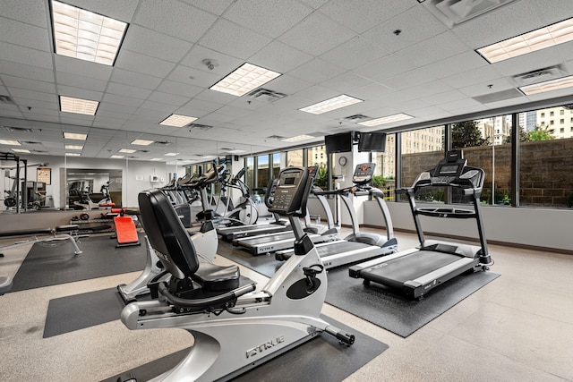 1200 Main St Unit 707, Dallas, TX 75202 - workout area with baseboards and a paneled ceiling