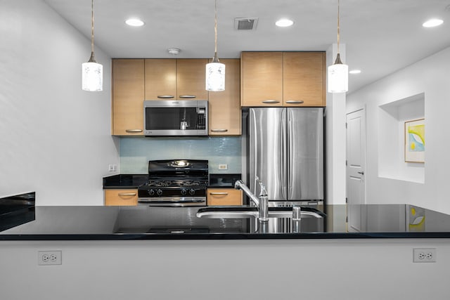 1200 Main St Unit 707, Dallas, TX 75202 - kitchen with stainless steel appliances, dark countertops, backsplash, recessed lighting, and hanging light fixtures