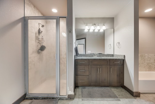 421 W Holford St, Pilot Point, TX 76258 - bathroom featuring a stall shower, vanity, and a garden tub