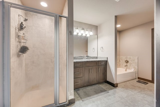 421 W Holford St, Pilot Point, TX 76258 - full bathroom featuring a stall shower, vanity, a bath, and tile patterned floors