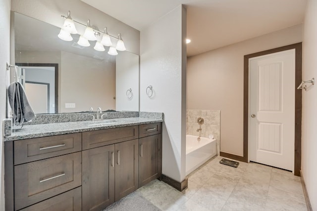 421 W Holford St, Pilot Point, TX 76258 - bathroom with vanity and a bath