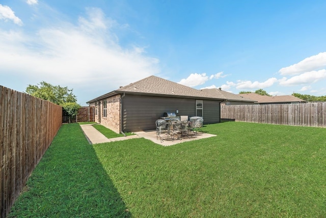 421 W Holford St, Pilot Point, TX 76258 - fenced backyard with a patio area