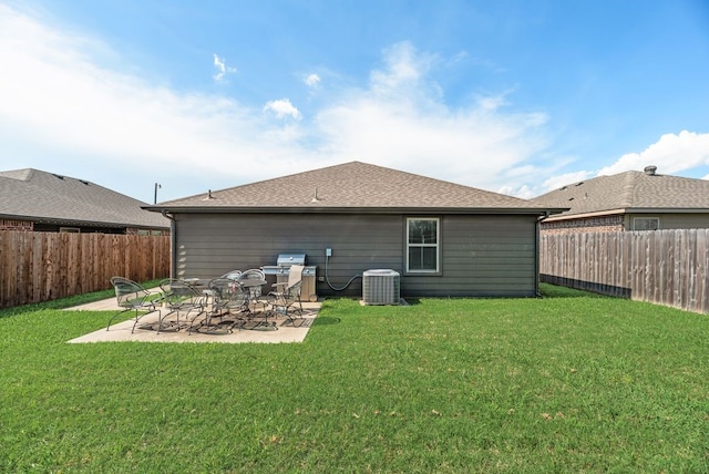 421 W Holford St, Pilot Point, TX 76258 - back of property featuring a fenced backyard, a patio area, and roof with shingles