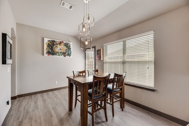421 W Holford St, Pilot Point, TX 76258 - dining area with wood finished floors and baseboards