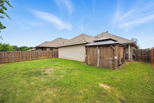 9117 Blakely Dr, Fort Worth, TX 76134 - fenced backyard with a gazebo