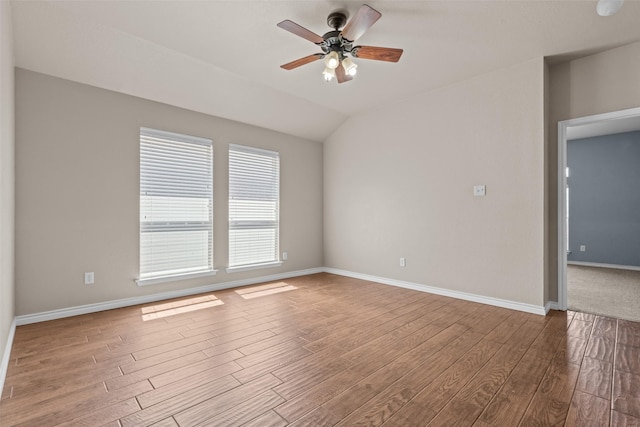 842 Randall Rd, Weatherford, TX 76087 - empty room with wood finished floors, ceiling fan, and vaulted ceiling