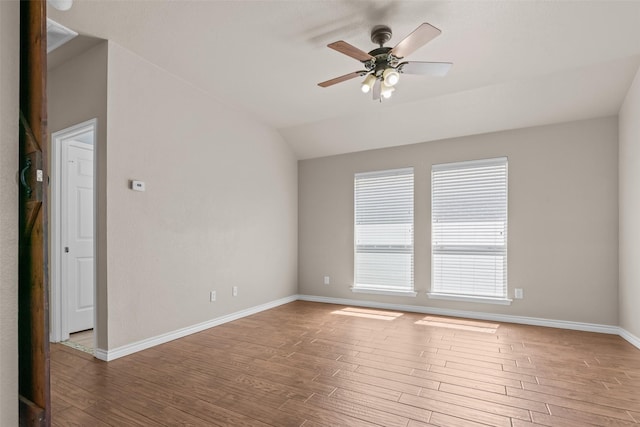 842 Randall Rd, Weatherford, TX 76087 - empty room featuring wood finished floors, a ceiling fan, and vaulted ceiling