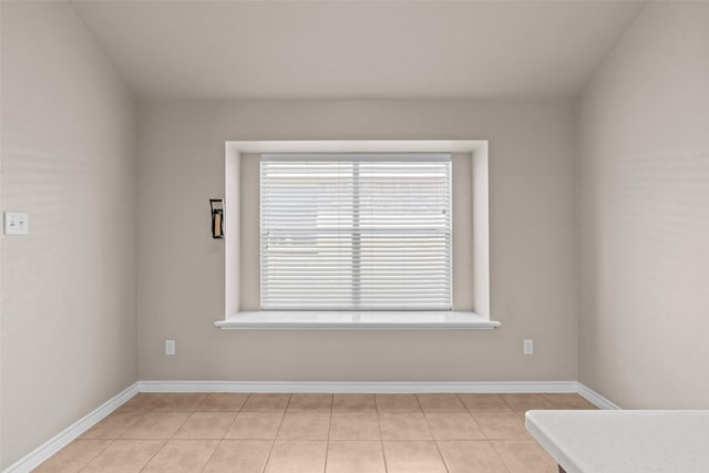842 Randall Rd, Weatherford, TX 76087 - unfurnished room with baseboards and light tile patterned floors