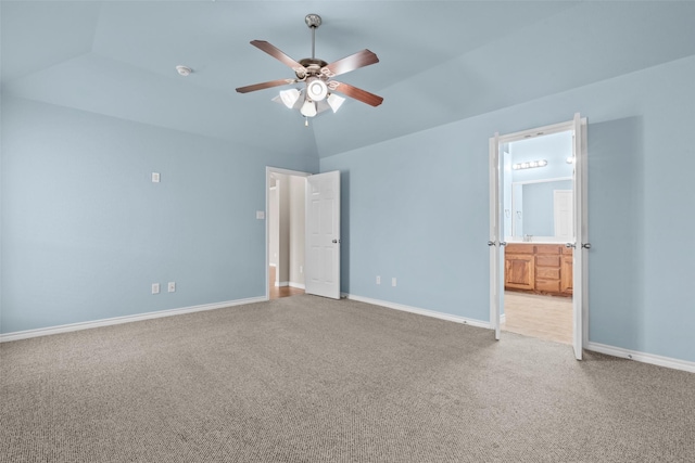 842 Randall Rd, Weatherford, TX 76087 - unfurnished bedroom featuring light colored carpet, ensuite bathroom, ceiling fan, and lofted ceiling