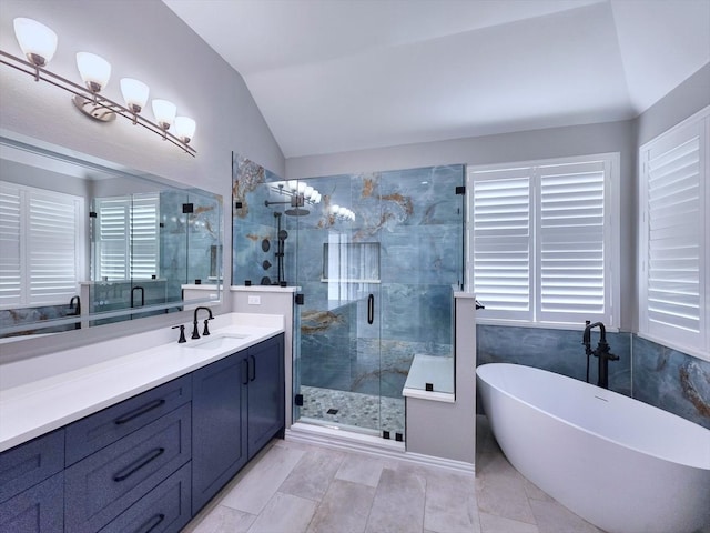 4348 Rice Ln, Carrollton, TX 75010 - bathroom with lofted ceiling, vanity, a freestanding bath, a shower stall, and healthy amount of natural light