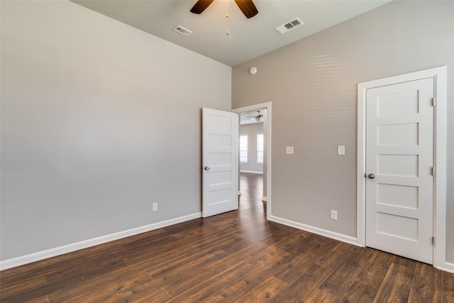 619 Buckalew St, Dallas, TX 75208 - unfurnished bedroom with dark wood-style floors and a ceiling fan