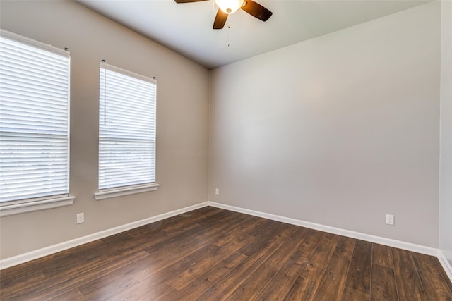 619 Buckalew St, Dallas, TX 75208 - empty room featuring ceiling fan and dark wood-style floors