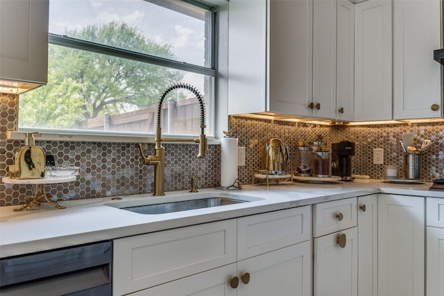 1400 Ambrose Dr, Allen, TX 75002 - kitchen with dishwashing machine, light countertops, backsplash, and plenty of natural light