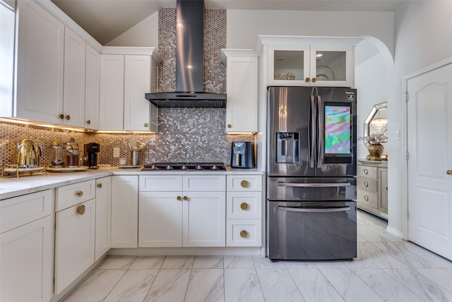 1400 Ambrose Dr, Allen, TX 75002 - kitchen featuring stainless steel fridge with ice dispenser, wall chimney range hood, light marble finish flooring, gas stovetop, and lofted ceiling
