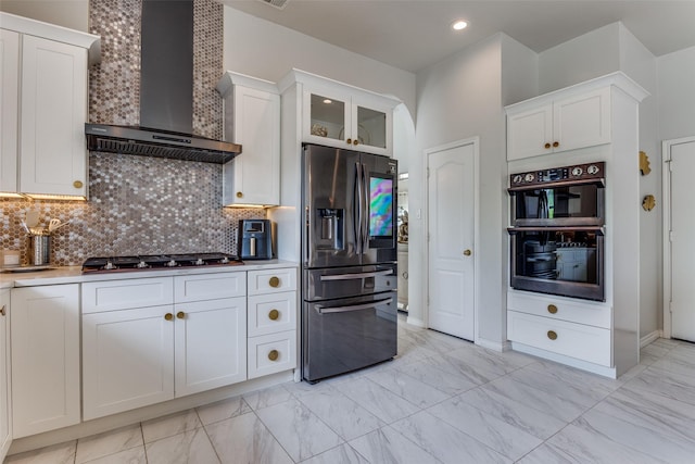 1400 Ambrose Dr, Allen, TX 75002 - kitchen with stainless steel refrigerator with ice dispenser, wall chimney range hood, double oven, gas stovetop, and light marble finish floors
