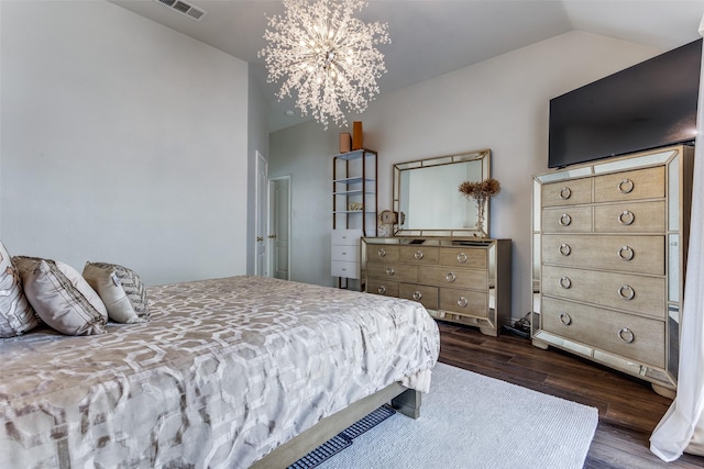 1400 Ambrose Dr, Allen, TX 75002 - bedroom featuring dark wood-type flooring, vaulted ceiling, and a chandelier