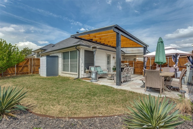 1400 Ambrose Dr, Allen, TX 75002 - back of property featuring a fenced backyard, a patio area, and a gazebo