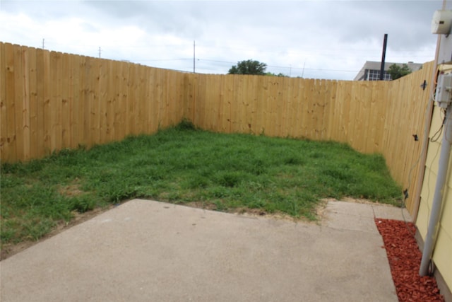 1108 Paintbrush St, Mesquite, TX 75149 - fenced backyard with a patio area
