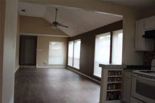 1108 Paintbrush St, Mesquite, TX 75149 - kitchen featuring white electric range, a ceiling fan, lofted ceiling, wood finished floors, and under cabinet range hood