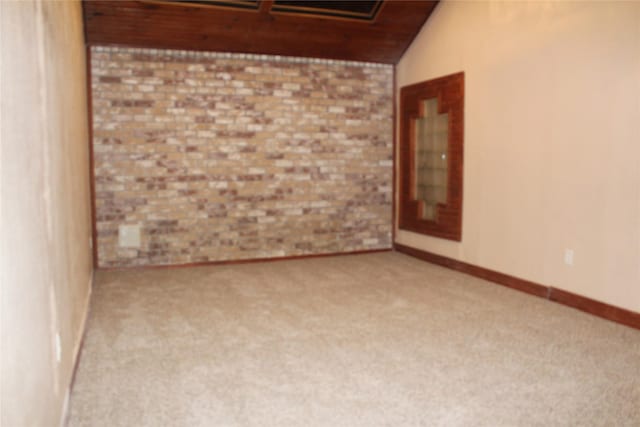1108 Paintbrush St, Mesquite, TX 75149 - carpeted spare room featuring brick wall, lofted ceiling, and wooden ceiling