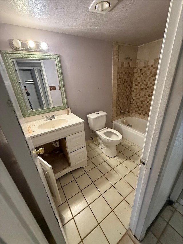 5918 Highcrest Dr, Garland, TX 75043 - bathroom with tile patterned flooring, a textured ceiling, vanity, and washtub / shower combination