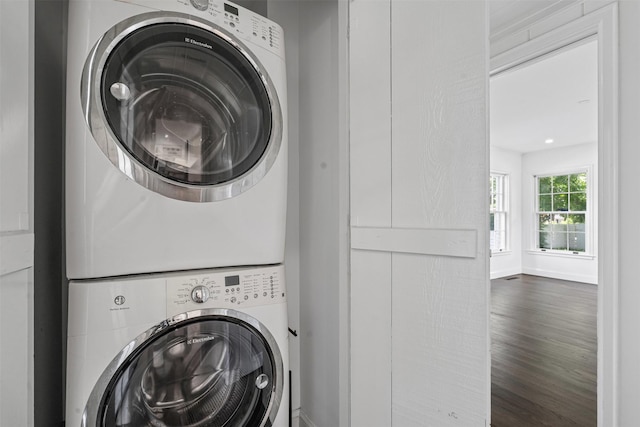 3601 Westcliff Rd S, Fort Worth, TX 76109 - laundry area with stacked washer / dryer and wood finished floors