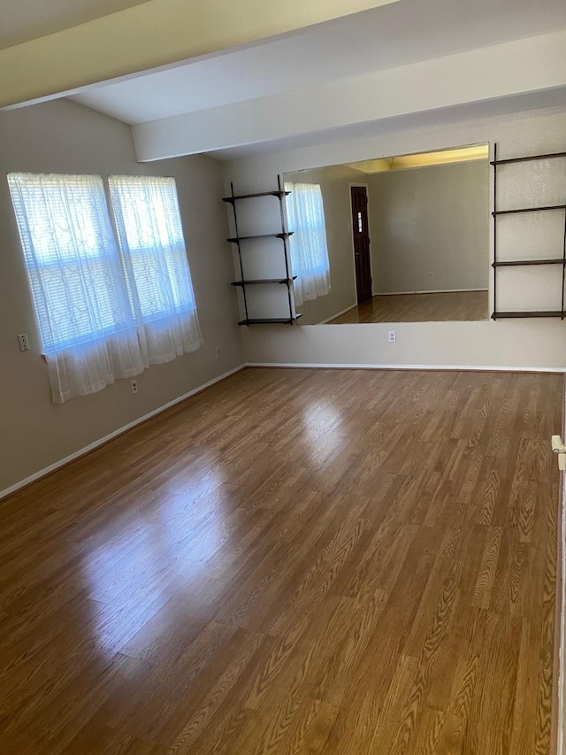 112 Jenny Kay Ln, Irving, TX 75060 - unfurnished room featuring dark wood-type flooring and baseboards