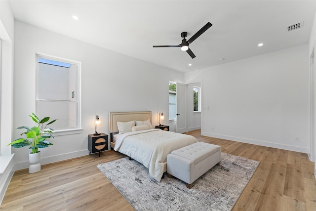 2828 Rochester St, Dallas, TX 75215 - bedroom with light wood-type flooring, recessed lighting, and a ceiling fan