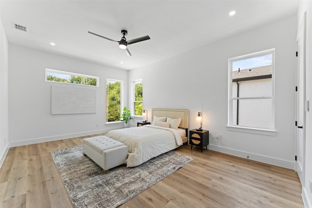 2828 Rochester St, Dallas, TX 75215 - bedroom featuring multiple windows, light wood-style floors, recessed lighting, and ceiling fan