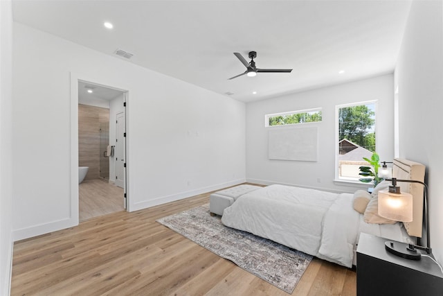 2828 Rochester St, Dallas, TX 75215 - bedroom with light wood-style flooring, recessed lighting, ensuite bath, and ceiling fan