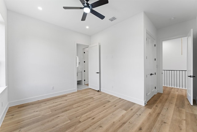 2828 Rochester St, Dallas, TX 75215 - unfurnished bedroom with light wood-style flooring, recessed lighting, connected bathroom, and a ceiling fan
