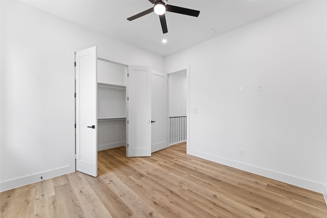 2828 Rochester St, Dallas, TX 75215 - unfurnished bedroom featuring light wood finished floors and a ceiling fan