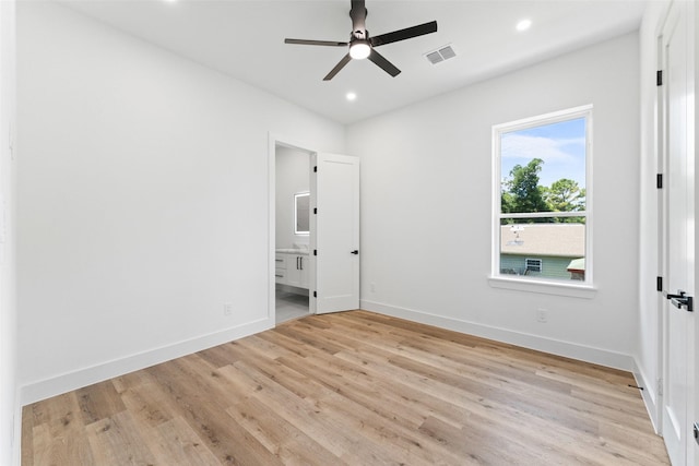 2828 Rochester St, Dallas, TX 75215 - unfurnished bedroom with light wood-style floors, recessed lighting, ensuite bath, and a ceiling fan