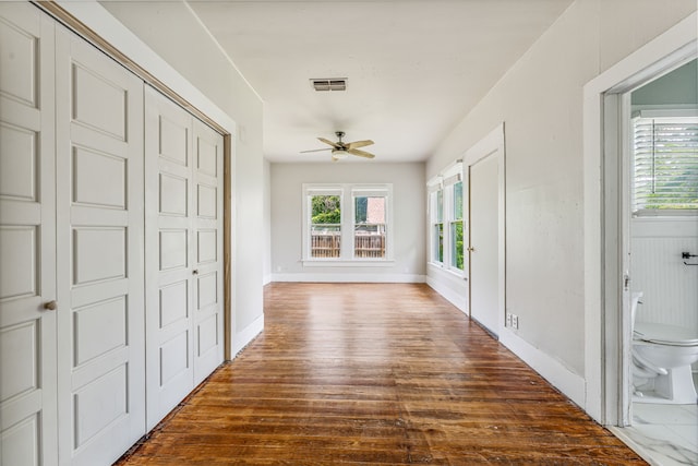 1143 W Jones St, Stephenville, TX 76401 - foyer entrance featuring ceiling fan and dark wood-style floors