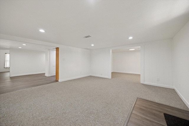 416 W 3rd St, Justin, TX 76247 - basement featuring recessed lighting, carpet flooring, and wood finished floors