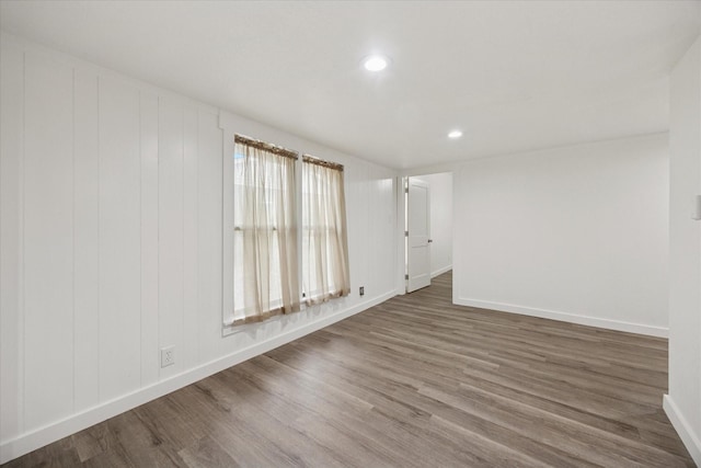 416 W 3rd St, Justin, TX 76247 - spare room with wood finished floors and recessed lighting