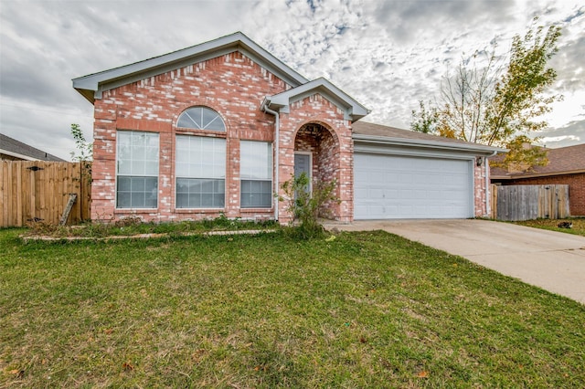 1008 Brook Cyn, Arlington, TX 76018 - view of front of home with brick siding, driveway, and an attached garage