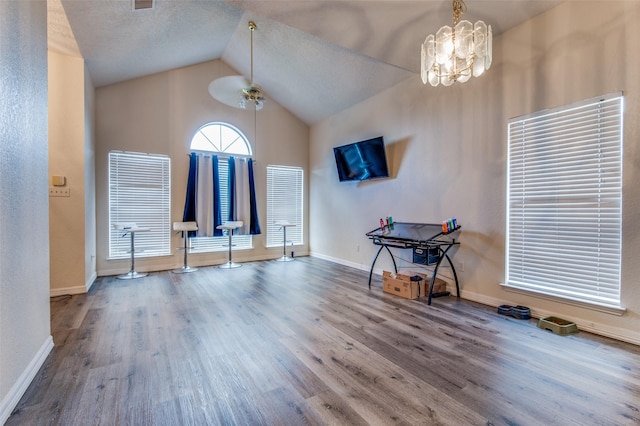 1008 Brook Cyn, Arlington, TX 76018 - entrance foyer with wood finished floors, lofted ceiling, and a chandelier