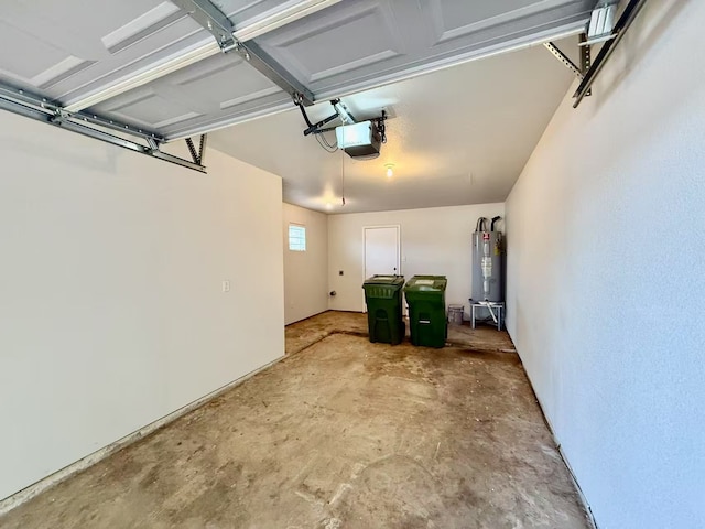 901 Glenn Crossett St, Arlington, TX 76010 - garage with a garage door opener and electric water heater