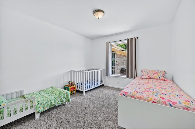 1031 Patricia Dr, Sherman, TX 75090 - bedroom featuring carpet floors and baseboards