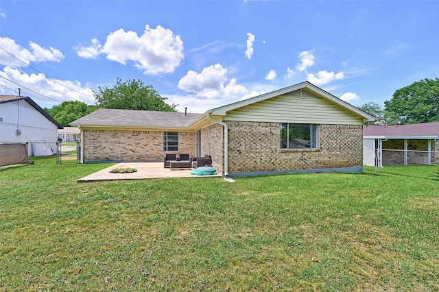 1031 Patricia Dr, Sherman, TX 75090 - back of property featuring a patio, brick siding, and a gate