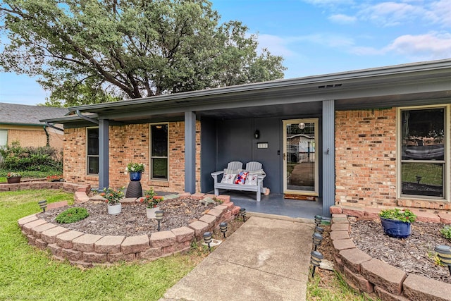910 Meadowside Cir, Garland, TX 75043 - entrance to property with brick siding and covered porch