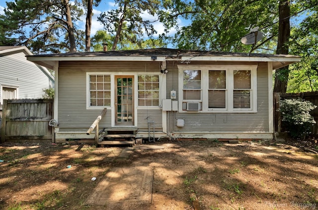 619 College St, Shreveport, LA 71104 - back of property featuring entry steps and cooling unit